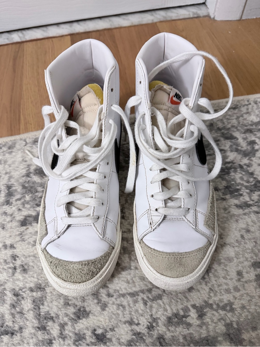 Nike Women’s White High-Top Sneakers with Black Swoosh blazer